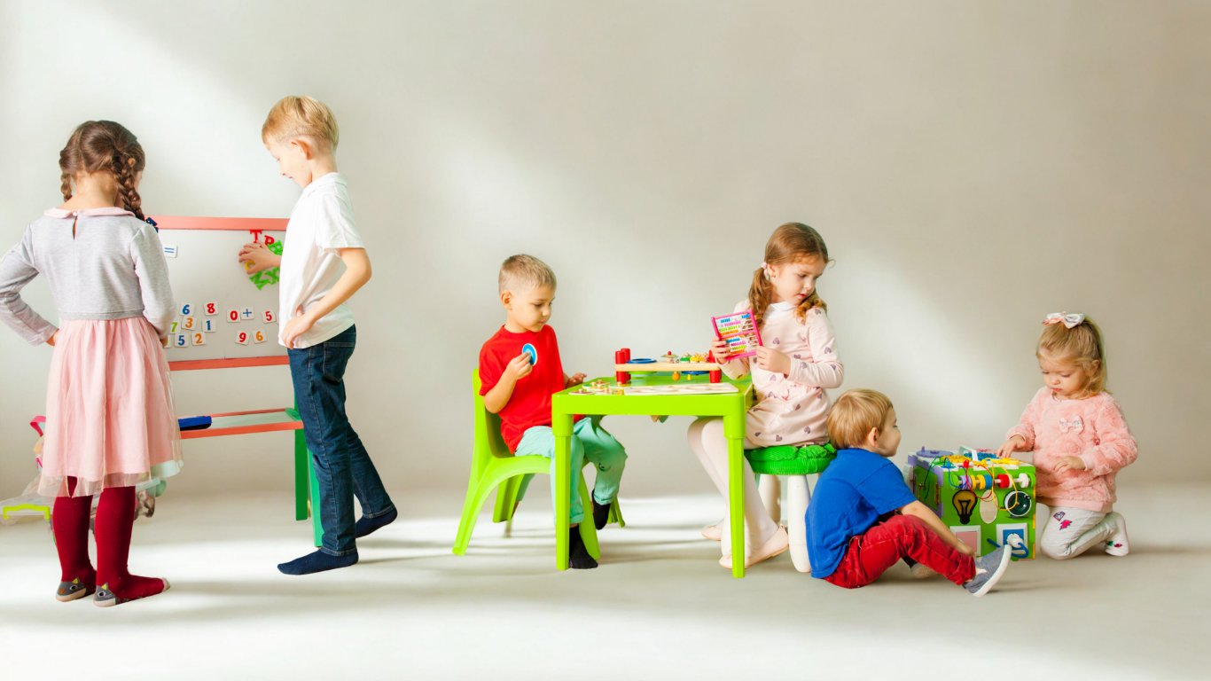 Diverse group of children of various ages (toddlers, preschoolers) playing with age-appropriate developmental toys on a beige background, illustrating different stages of growth.